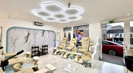 Elegant interior of Brigid Nails in Monaghan, County Monaghan, IE featuring luxury pedicure chairs and modern decor.