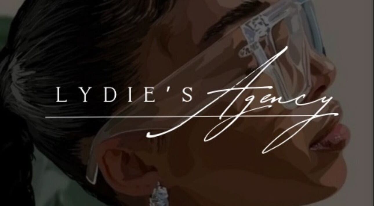 Logo artistique de Lydie’s Agency à Villeneuve-Tolosane, Occitanie, FR, avec lunettes modernes.