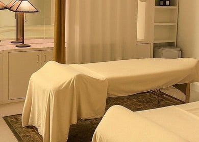 Relaxing massage room at Noble Men’s Spa, New York, New York, US with warm lighting and cozy ambiance.