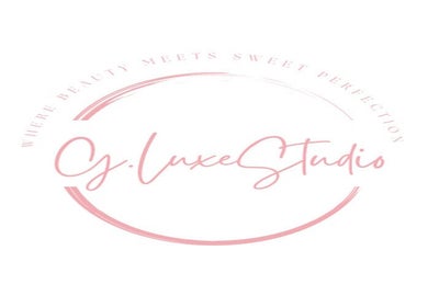 G.luxeStudio logo in Christ Church, BB, showcasing elegant pink script design.