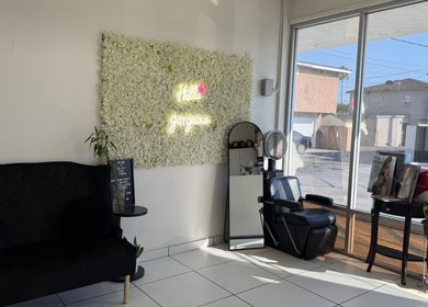 Modern seating area at Virginia’s Beauty Creations inside Belleza Glam Studio, South Gate, California, US.