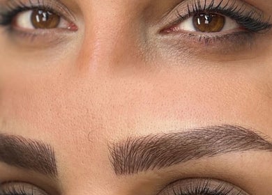 Close-up of expertly shaped eyebrows at Afraclinic, Vancouver, British Columbia, CA.