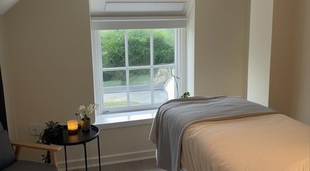 Relaxing therapy room at Malia Organic Therapies, Christchurch, Hampshire Dorset, GB.