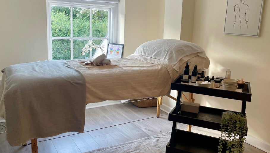 Massage bed at Louisa Sales Malia Organics, Christchurch, Hampshire, GB, enhancing relaxation and wellness.