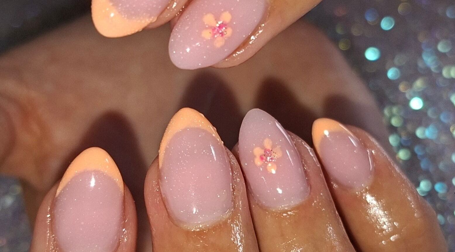 Elegant nail art with peach tips at Jade's Beaut's @No7 in Woodville, England, GB.