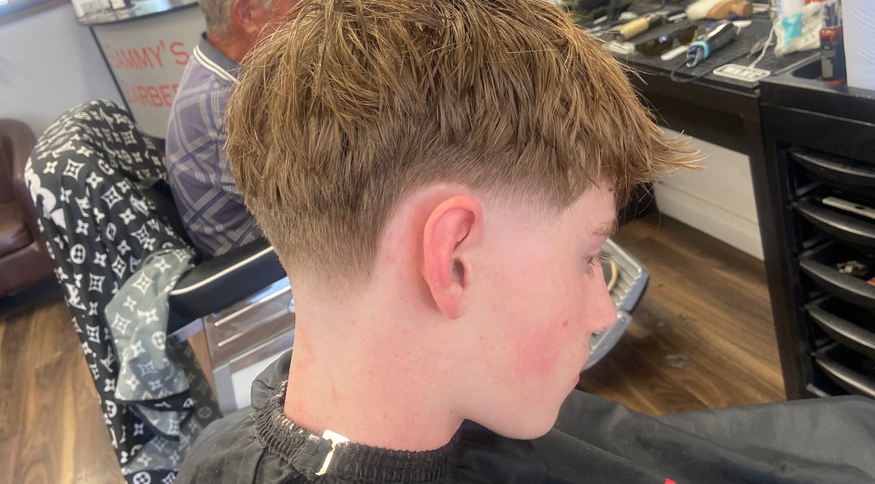 Close-up of a fresh haircut at Tobias The Barber, Bognor Regis, England, GB.