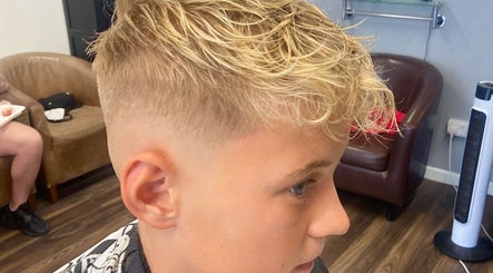 Stylish blonde haircut at Tobias The Barber, Bognor Regis, England, GB.