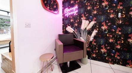 Stylish seating nook at Herbal Beauty Studio, featuring floral wallpaper in London, England, GB.