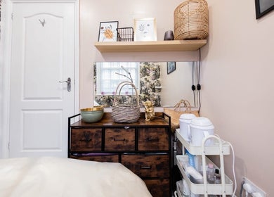 Interior of Herbal Beauty Studio in London, England, GB showcasing decor, storage, and wellness products.