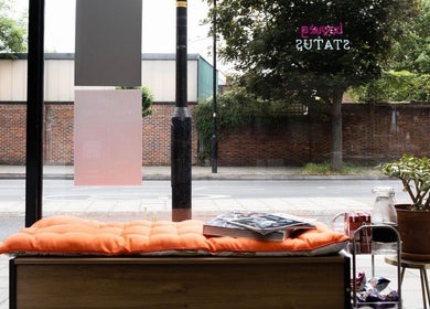 Cozy seating at Herbal Beauty Studio, London, England, GB with street view for a relaxing experience.