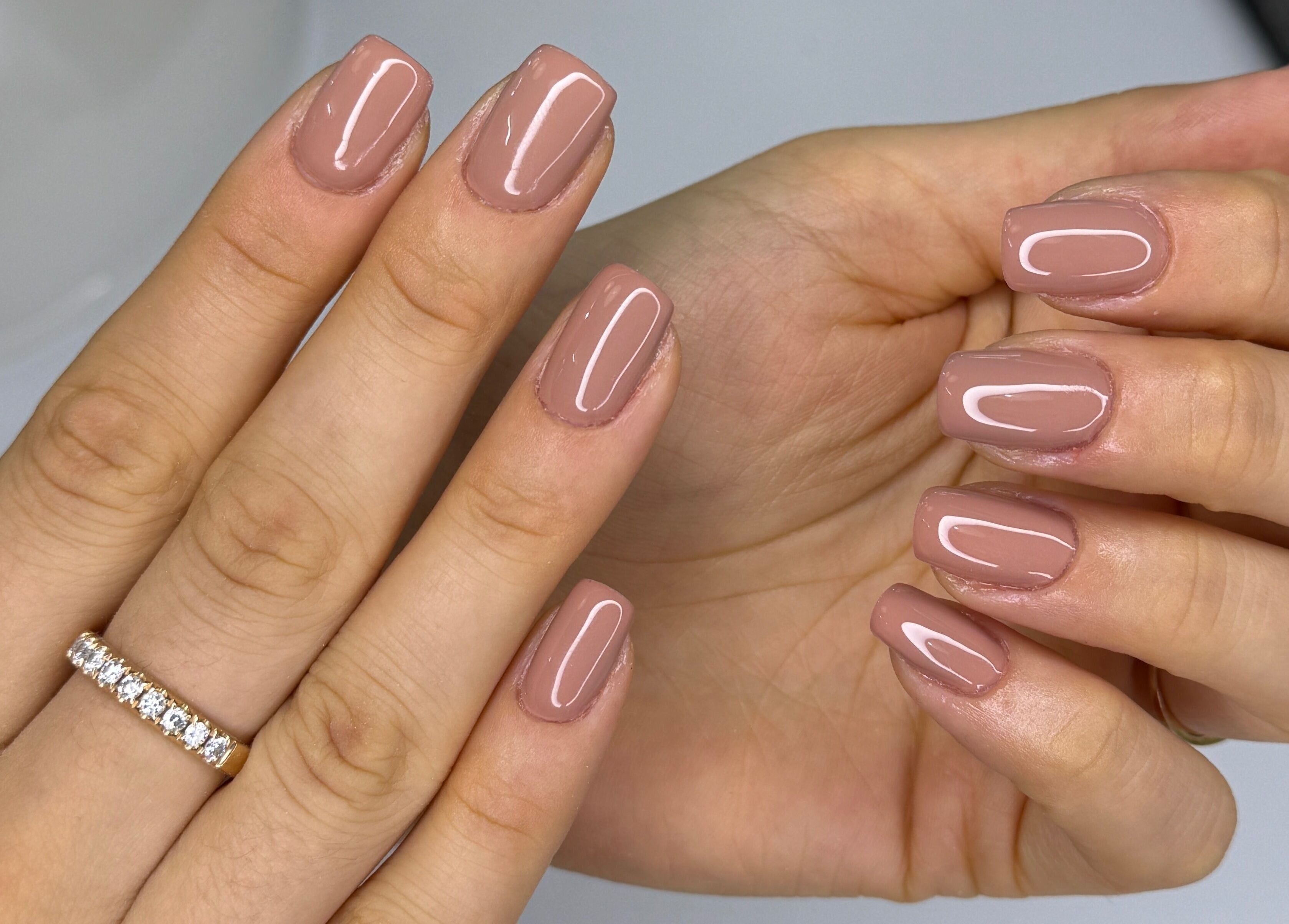 Elegant nude manicured nails at Arya Beauty Salon, Budapest, Magyar, HU.