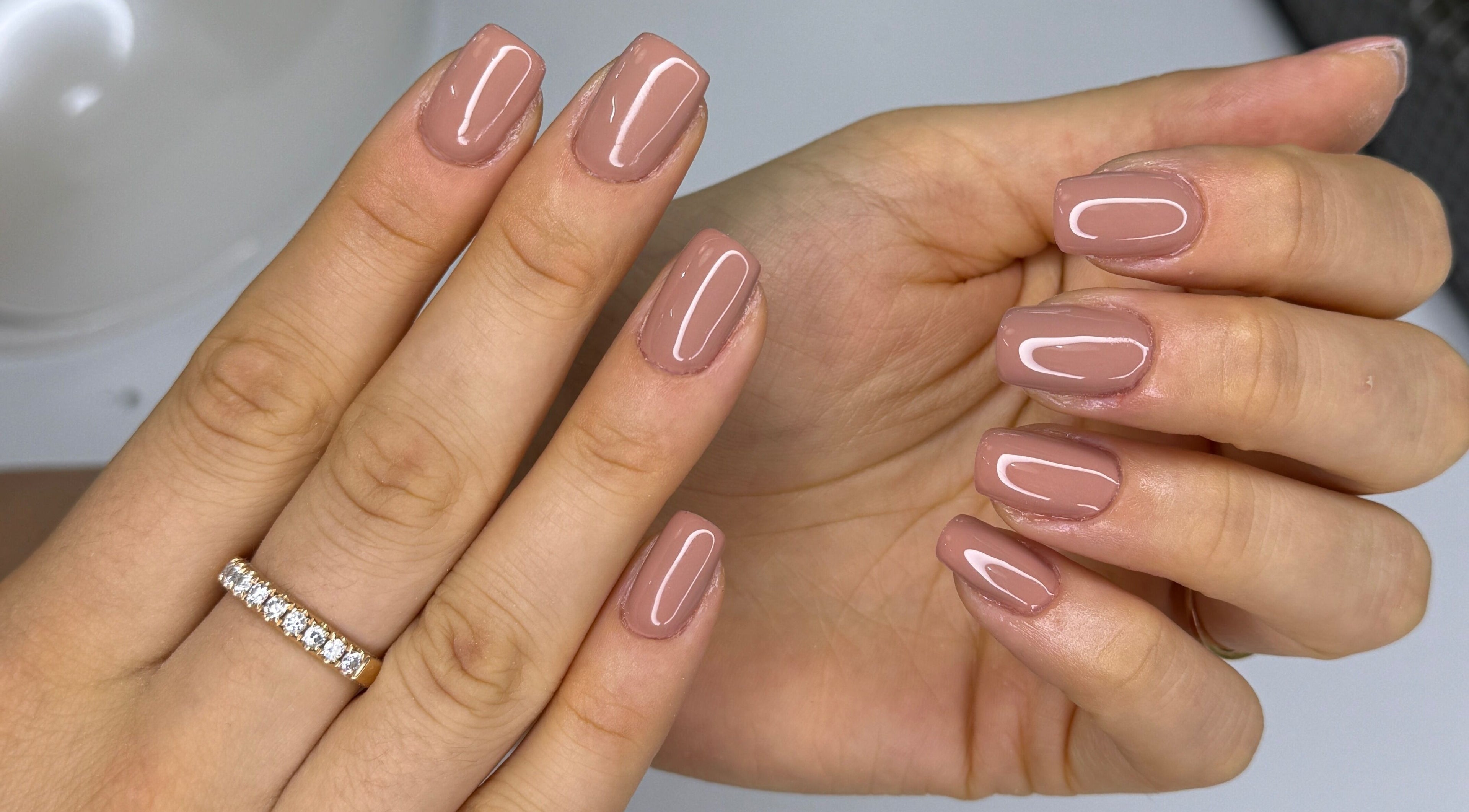 Elegant nude manicured nails at Arya Beauty Salon, Budapest, Magyar, HU.