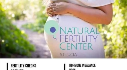 Expecting mother holding belly at Fertility and Weight Management Center St Lucia, Gros Islet, Gros Islet, LC.