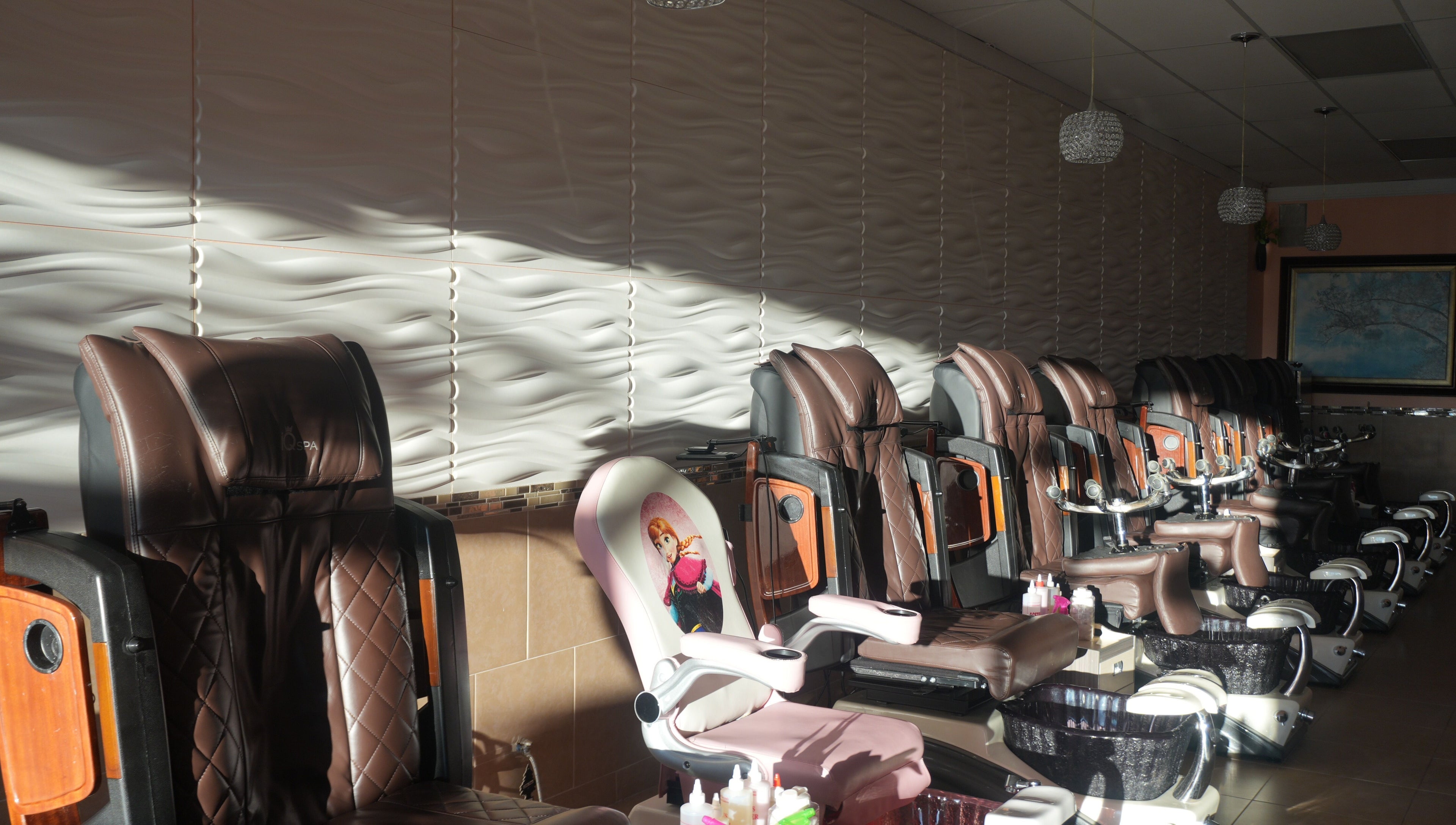 Comfortable spa chairs at Awesome Nails in Lexington, Kentucky, US ready for pampering sessions.