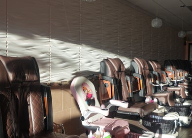 Comfortable spa chairs at Awesome Nails in Lexington, Kentucky, US ready for pampering sessions.
