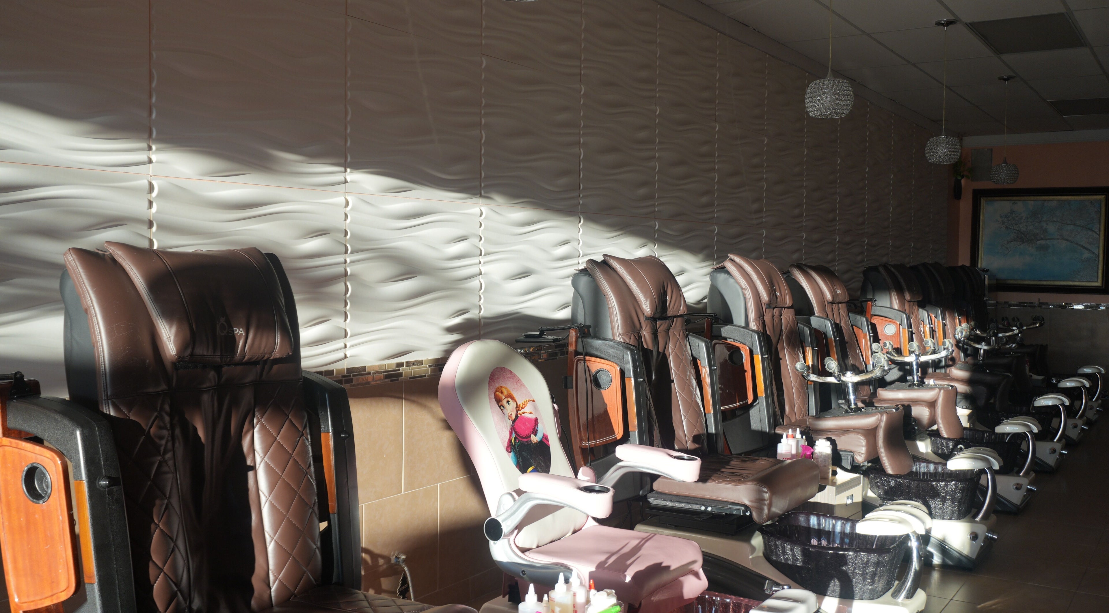 Comfortable spa chairs at Awesome Nails in Lexington, Kentucky, US ready for pampering sessions.