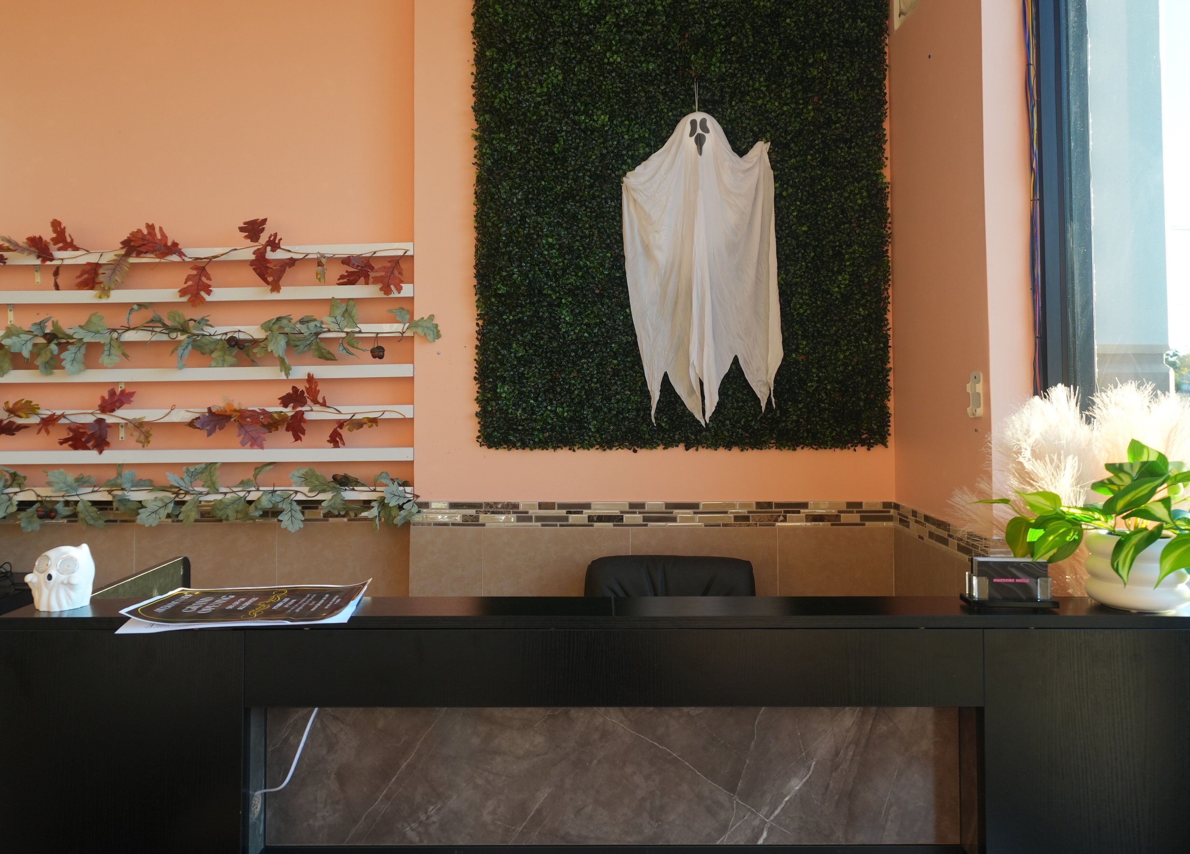 Welcoming interior of Awesome Nails in Lexington, Kentucky, US with seasonal decor and modern design.