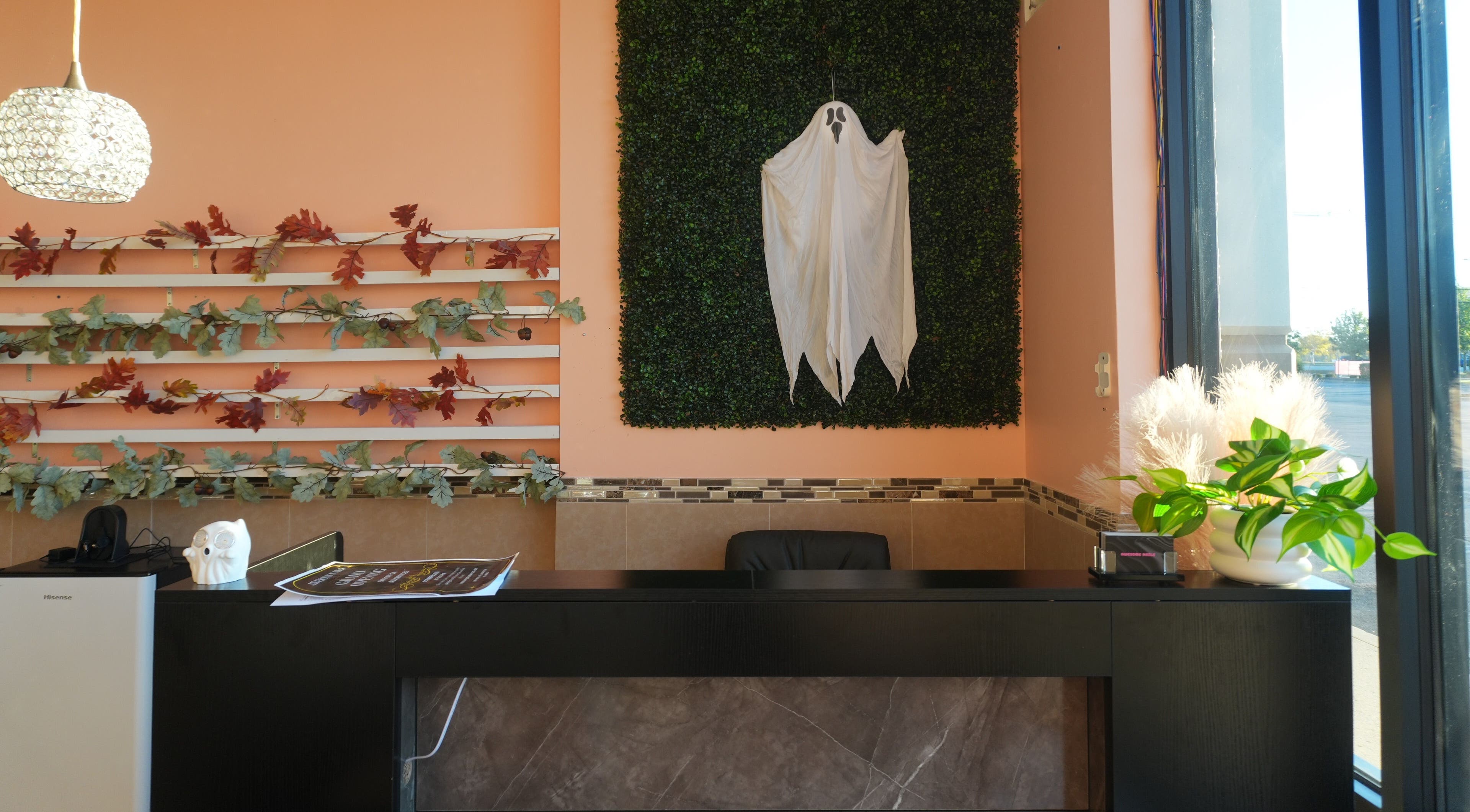 Welcoming interior of Awesome Nails in Lexington, Kentucky, US with seasonal decor and modern design.