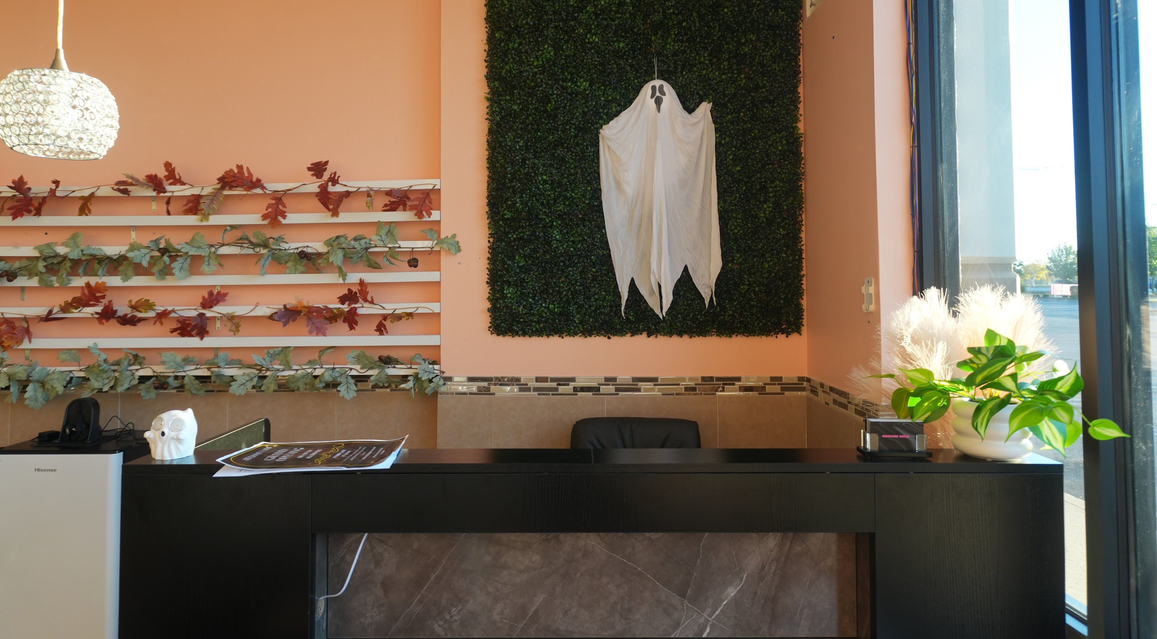 Welcoming interior of Awesome Nails in Lexington, Kentucky, US with seasonal decor and modern design.