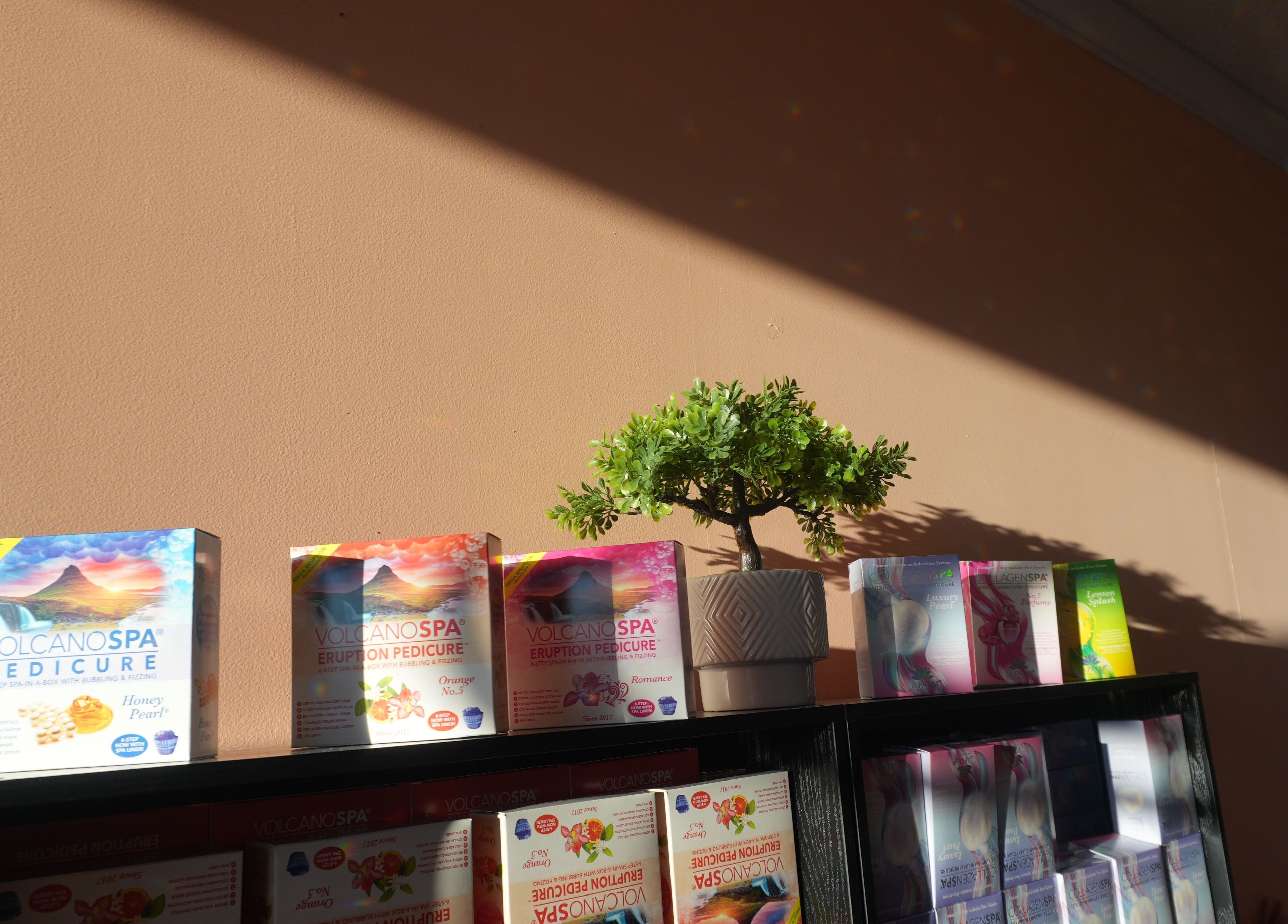 Pedicure product display at Awesome Nails, Lexington, Kentucky, US, featuring spa essentials.