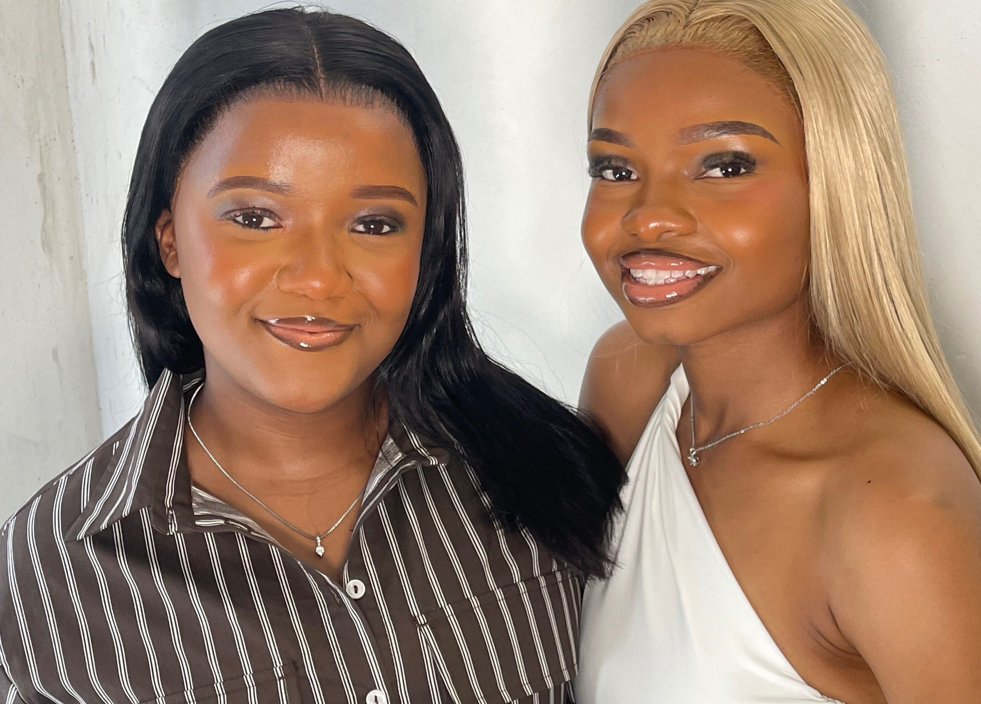 Two smiling women showcasing chic styles at SlayedbyNikita, Cape Town, Western Cape, ZA.