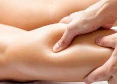 Therapist massaging leg at Prairie Place RMT in Vermilion, Alberta, CA for relaxation.