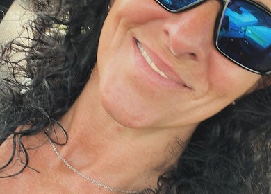 Smiling person in sunglasses, Prairie Place RMT, Vermilion, Alberta, CA.