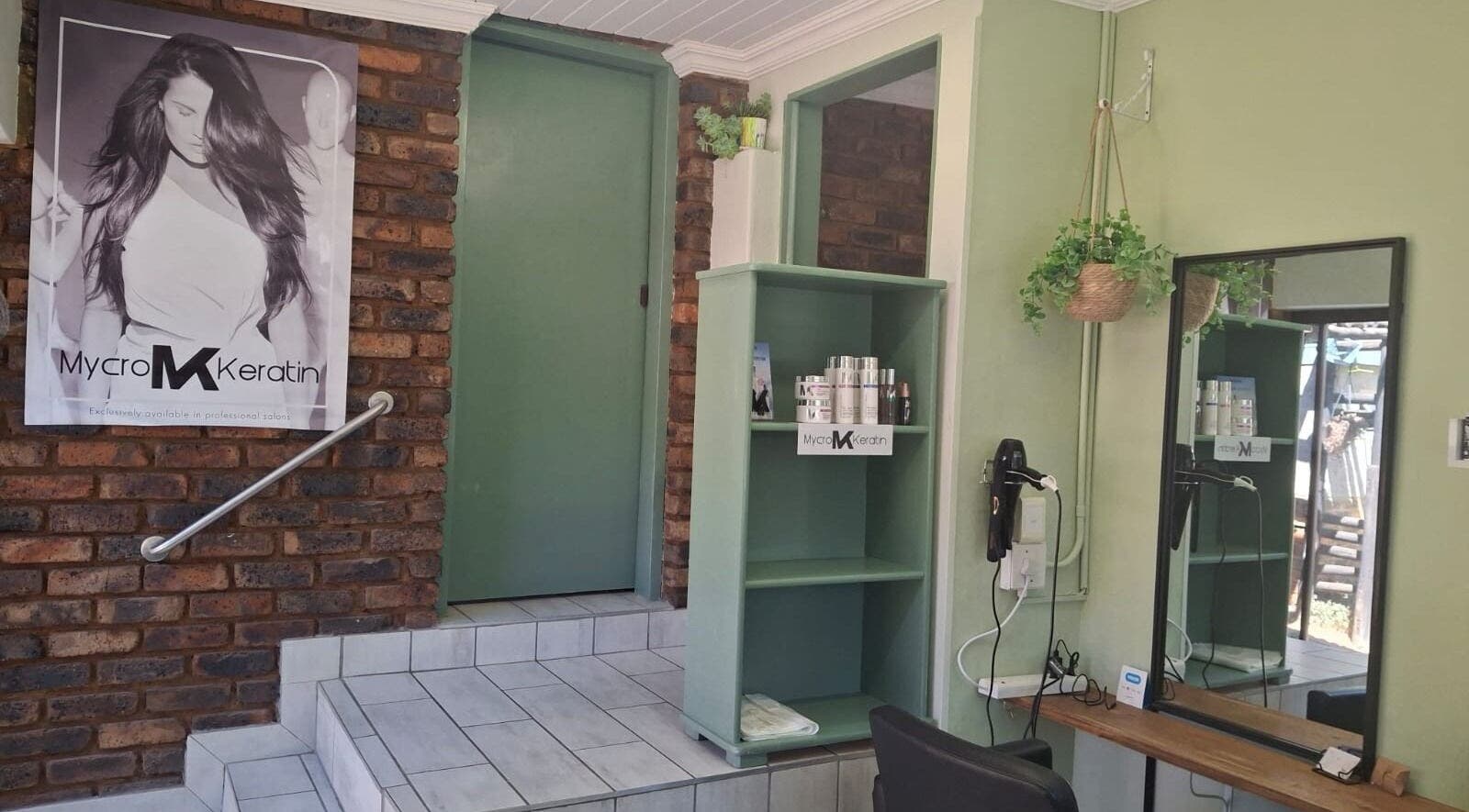 Elegant salon interior at Flow By Ane, Pretoria, Gauteng, ZA, featuring beauty products and styling stations.