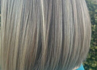 Beautiful blonde highlights at Flow By Ane, Pretoria, Gauteng, ZA, showcasing expert hairstyling.