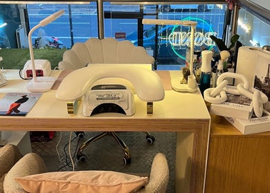 Elegant nail station at Bonnie Belle Nails, Glasgow, Scotland, GB. Modern decor with manicure tools.
