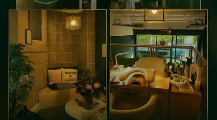 Warm, inviting nail salon interior of Bonnie Belle Nails in Glasgow, Scotland, GB, with ambient lighting and decor.