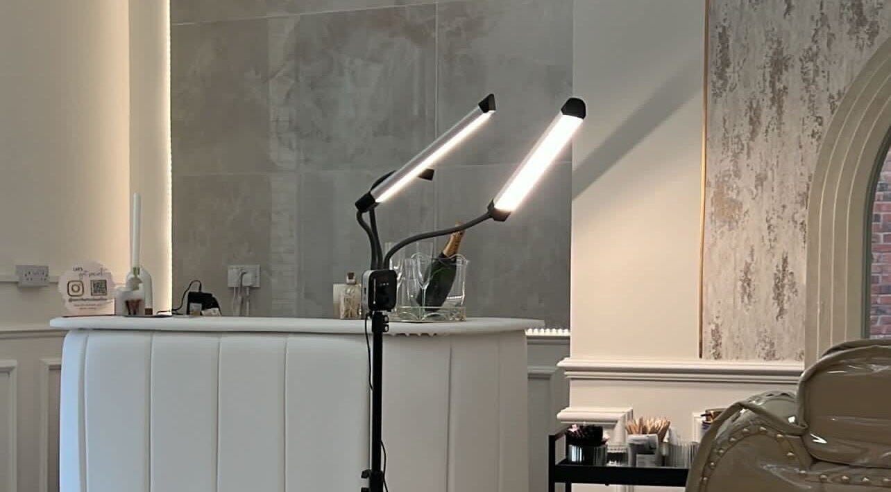 Modern salon setup at PopsBrows - WagLash HQ, Shirley, England, GB, featuring stylish lighting.