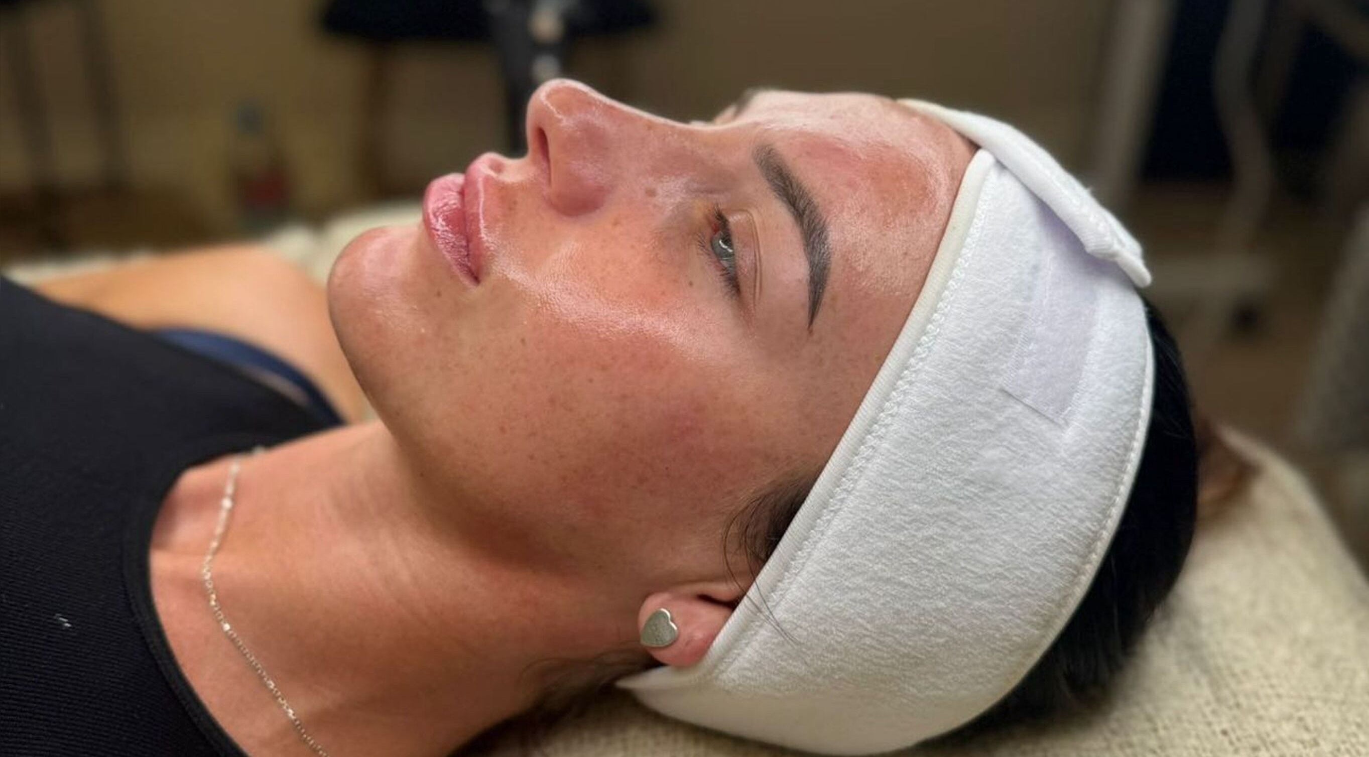Client enjoying a rejuvenating facial at Juicy Details Skin Clinic, Manchester, England, GB.