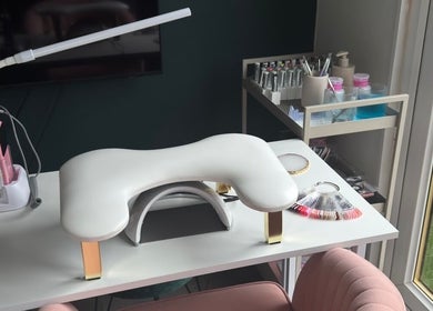 Elegant nail station setup at Mani By Lucie, Bromley, England, GB with tools and polish selection.