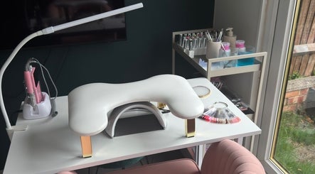 Elegant nail station setup at Mani By Lucie, Bromley, England, GB with tools and polish selection.