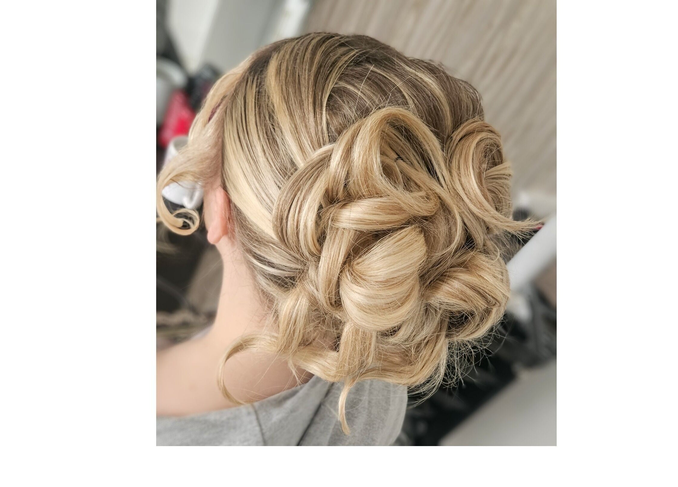 Intricate blonde updo hairstyle created at Hair by Hayley P, Liverpool, England, GB.