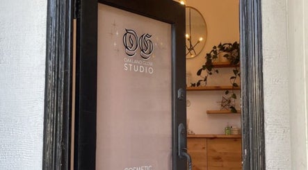 View of Oakland Glow Studio entrance in Oakland, California, US with sleek decor and greenery.