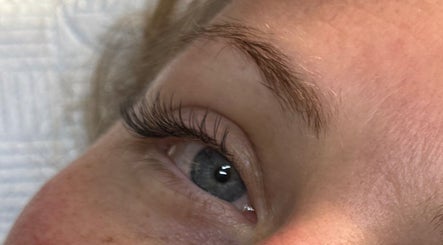Close-up of a styled eyelash at LashandBe in London, England, GB, highlighting beauty services.