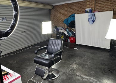 Modern barber chair with professional lighting at TruongTrims, Melbourne, Victoria, AU.