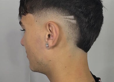 Close-up of trendy fade haircut with lines at TruongTrims, Melbourne, Victoria, AU.