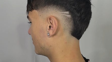 Close-up of trendy fade haircut with lines at TruongTrims, Melbourne, Victoria, AU.