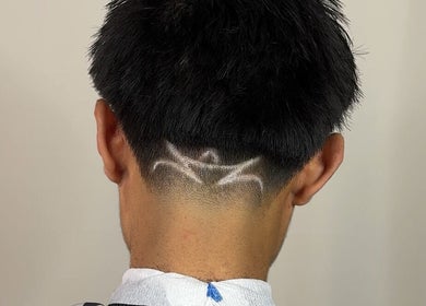 Unique hair design at TruongTrims in Melbourne, Victoria, AU, showcasing expert barber artistry.