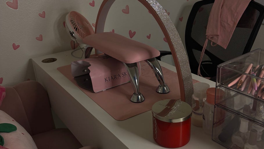 Nail station at Kait Beauty in Downey, California, US with pink decor and manicure tools.