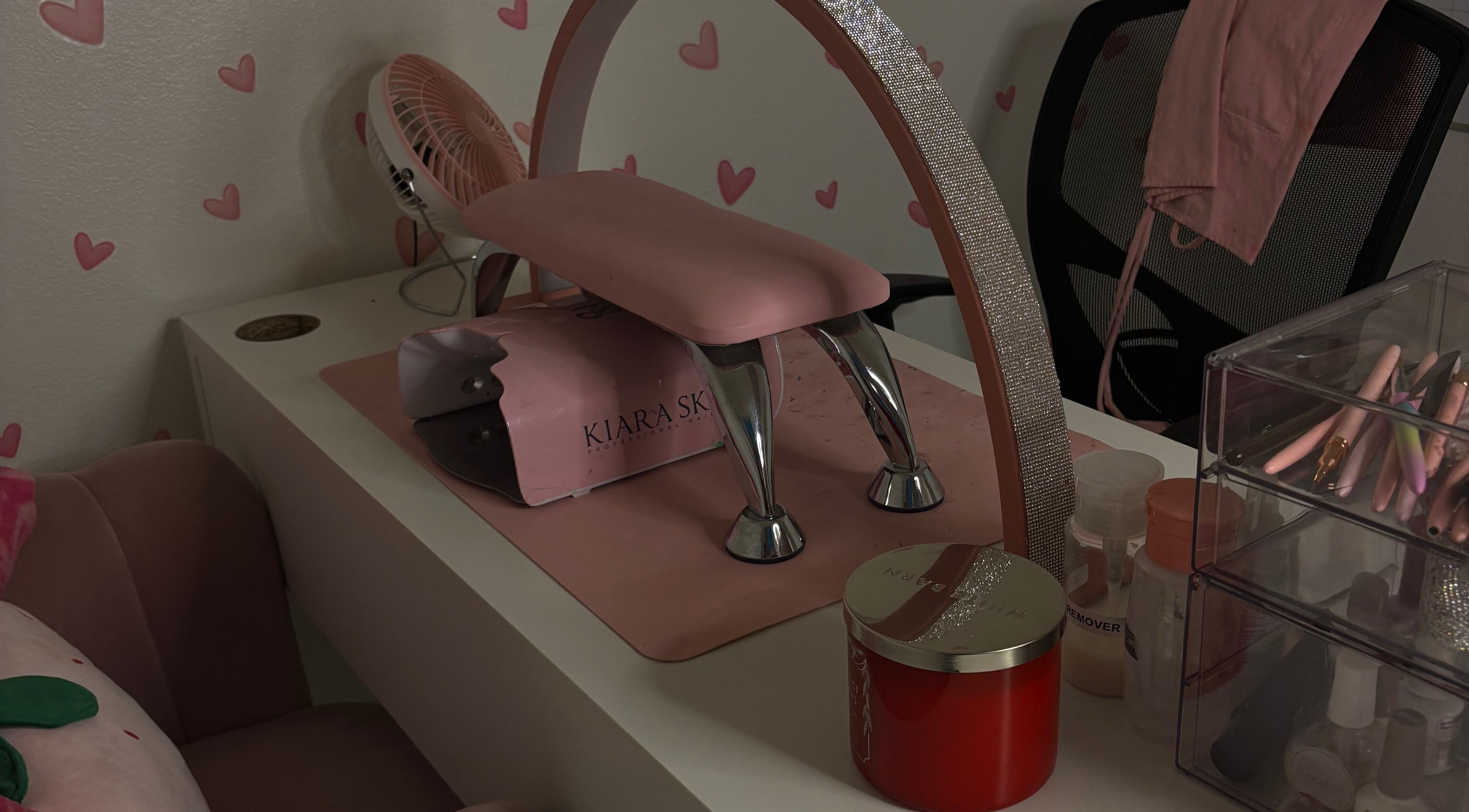 Nail station at Kait Beauty in Downey, California, US with pink decor and manicure tools.