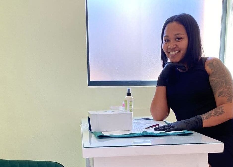 Gizzelle B staff welcoming clients in Cape Town, Western Cape, ZA for beauty services with a friendly smile.