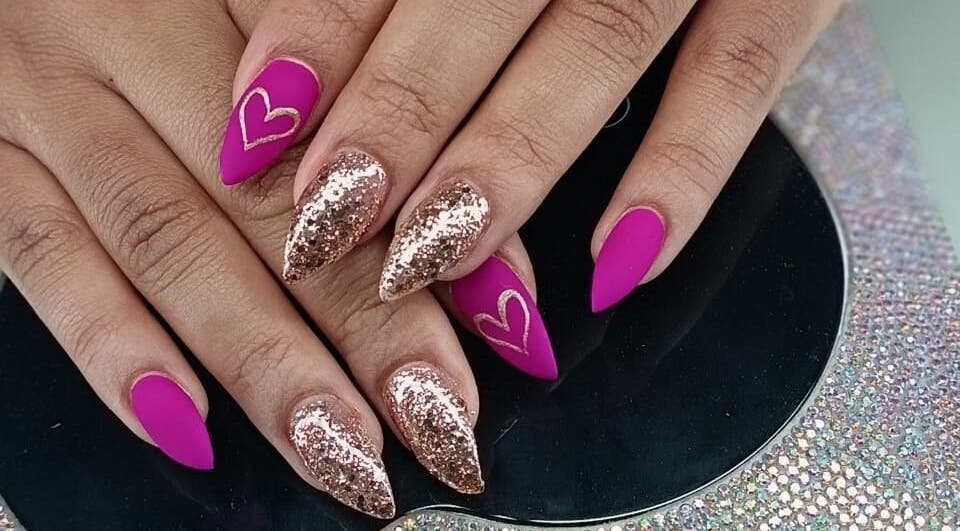 Sparkling nail art at Gizzelle B, Cape Town, Western Cape, ZA, featuring pink and glittery designs.
