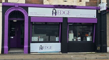 Front entrance of Anaya Beauty in Inverness, Scotland, GB featuring purple and black design.