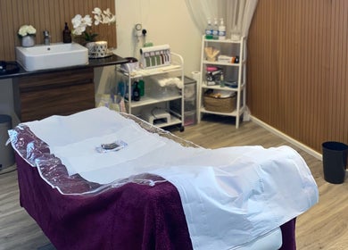 Relaxing treatment room at Anaya Beauty, Inverness, Scotland, GB, featuring a comfortable massage table.