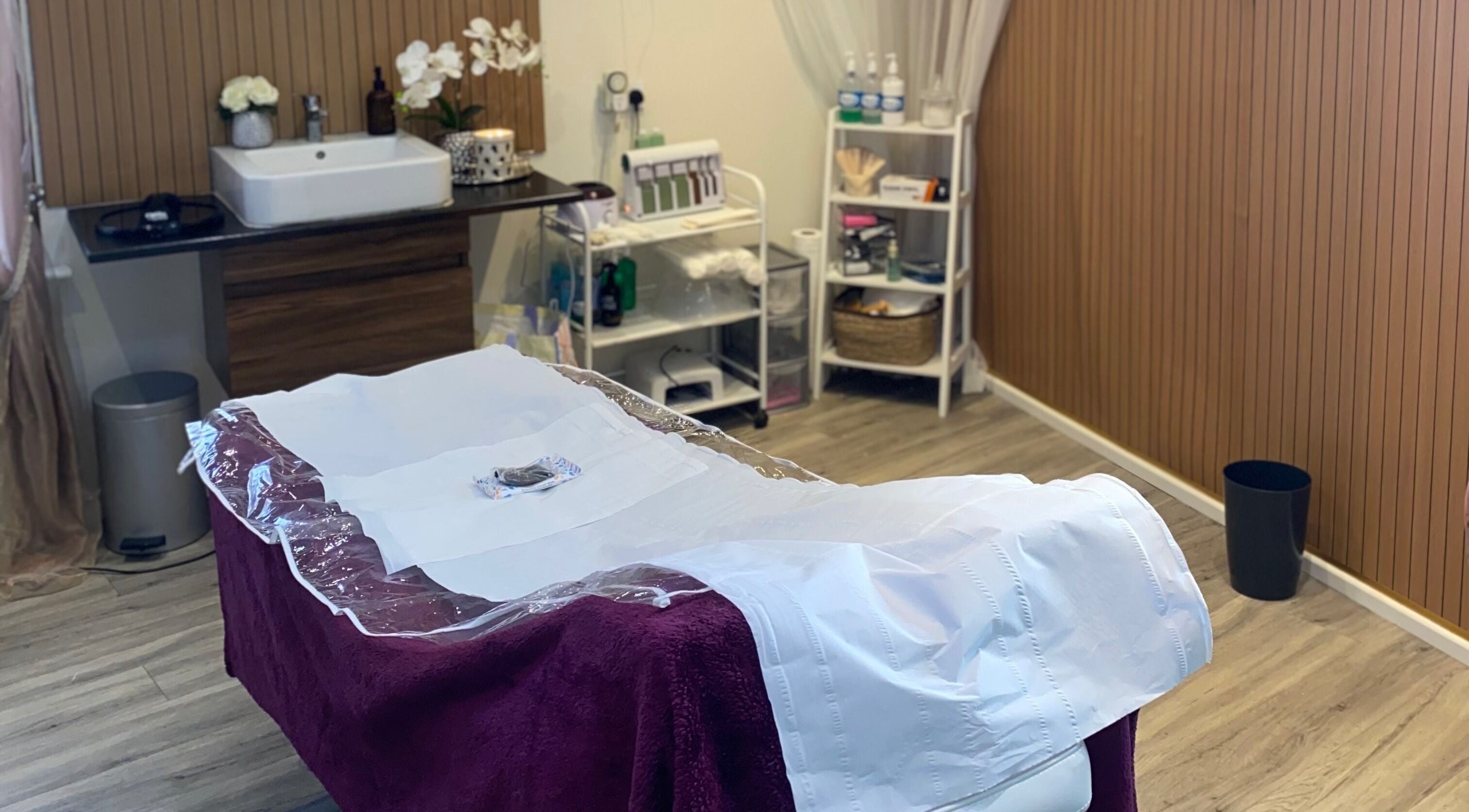Relaxing treatment room at Anaya Beauty, Inverness, Scotland, GB, featuring a comfortable massage table.