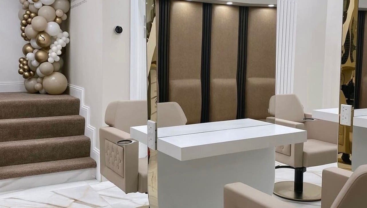 Modern beauty salon interior at Beauty by Chloe in Strabane, Northern Ireland, GB with stylish chairs and decor.
